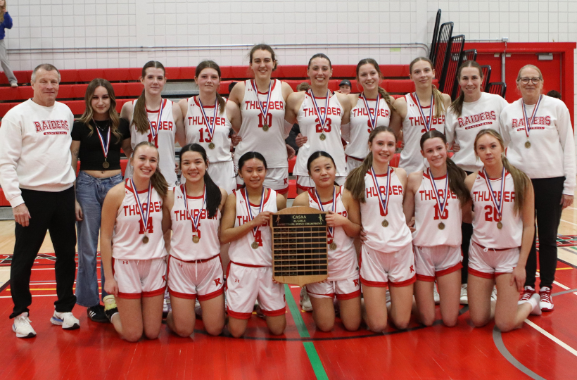 Senior Girls basketball team photo after winning the Championship game