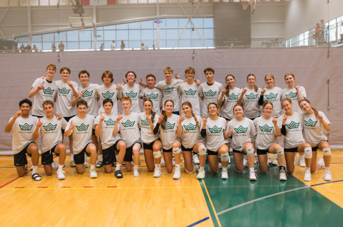 Senior boys and girls wearing tournament champions shirts