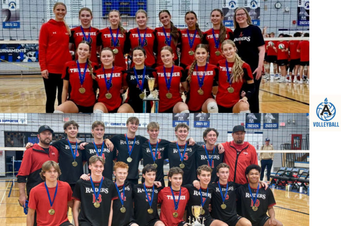 Senior volleyball teams with tournament trophy