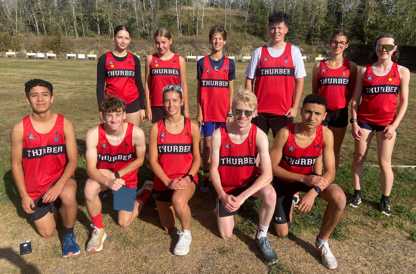 11 students from the Raiders Cross Country Running team
